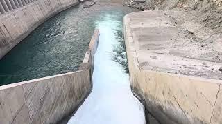 Managing Dam Gate Overflow Discharge