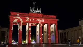 Hackers breach the projection on the Brandenburg Gate in Berlin and put up the Soviet victory banner