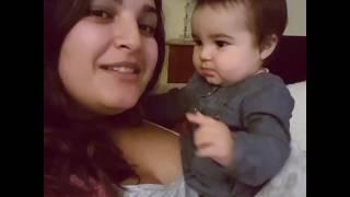 Baby kisses her mother funny