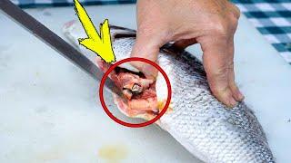 The woman screamed in fear when she saw what was inside the fish!