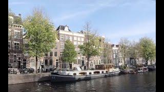 Cycling Along Amsterdam Canals