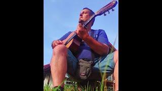 Playing some Acoustic Guitar in the Sunlight 20.6.2024
