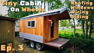 Roofing, Wiring, Staining, Windows, Siding PLUS The first TEST DRIVE | Tiny Cabin On Wheels | EP. 3