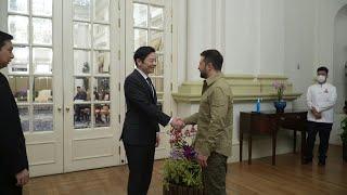 Zelensky meets with president and prime minister of Singapore | AFP