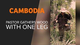 CAMBODIA - Pastor Goohen Gathers Wood with One Leg