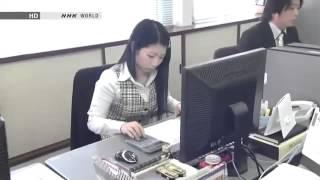 Japanese Girl Using a Calculator Like a Boss