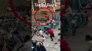 Kid gets very lucky bystander saves the day!