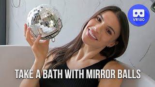 Stunningly beautiful girl takes a bath of mirror balls in VR180 3D