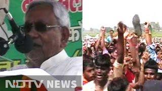 Bihar Chief Minister Nitish Kumar shown slippers at rally in Nawada