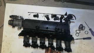 BMW E60 530d 170Kw...M57... Assembling plugs into the intake manifold...