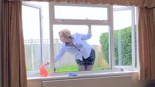 Window Cleaning In A PVC Mini Skirt