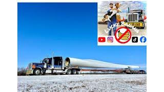 145 feet long! Hauling a wind tower blade up north