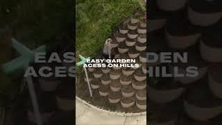 Terrace gardening for erosion control on a hillside backyard: Dirt Locker® gardening planters