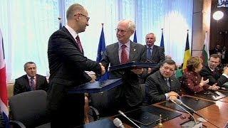 Ukraine signs political deal with EU