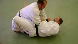 An Armbar finish from the full guard position.