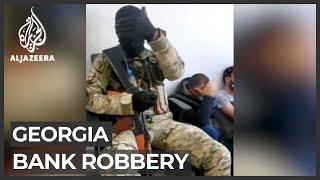 Georgia bank robber escapes after hostages freed