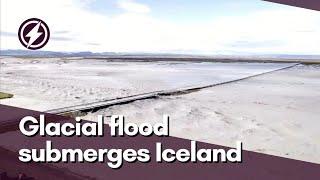 Drone footage shows glacial flood waters submerging road in southern Iceland