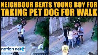 Angry neighbour beats young boy for taking pet dog for walk in society | Viral Video