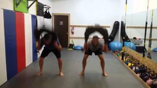 Bulgarian Bag Burpees at Roundkick Gym