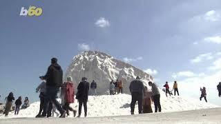 Snow or Salt! Citizens in Egypt Slide & Play on Mounds of Salt Instead of Snow!