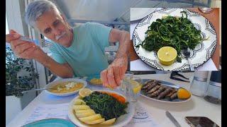 Hortafarmer shows how to eat horta in tavern in Crete