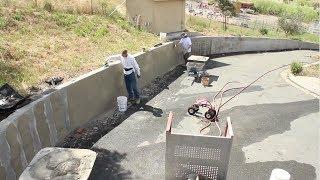 Stucco concrete retaining walls.