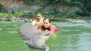 Adventure in the forest  Man with women found big pig in water for grilled - Eating delicious