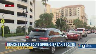 Crowds rush Clearwater Beach for the first unofficial day of Spring Break