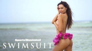 Alexis Ren Wears Nothing But A Bikini Bottom Made Of Flowers | Candids | Sports Illustrated Swimsuit