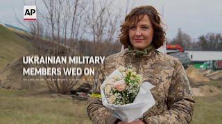 Ukraine defence members wed on first defence line