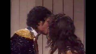 Michael Jackson & Irene Cara kiss backstage at the 26th Annual Grammy Awards (February 28, 1984)