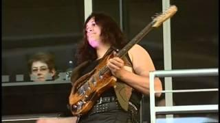 Kara Gordon at Dunedin Stadium playing on his Langcaster guitar for 34000 people.