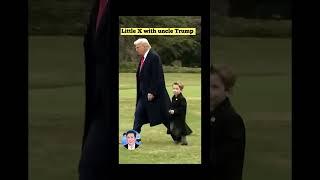 Too cute - little X with uncle Trump