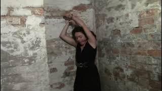 Girl Shackled To The Wall