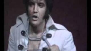 Elvis Presley - Suspicios Minds (lyrics)