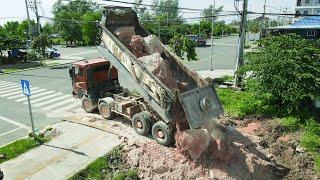 Start Large Fill Up Land Project By KOMATSU DOZERS Push and Dumping Stone Mixed Rock