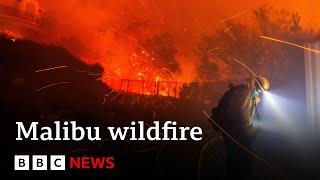 Evacuations ordered as wildfire spreads near Malibu | BBC News