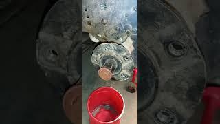 cleaning up the  wheel hub and Axel shaft