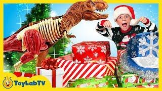 Christmas for the Dinosaurs! Opening Dinosaur Presents from Santa & Jurassic World Surprise Toys