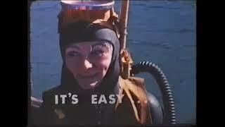 Blonde woman learn scuba diving with vintage equipent. Old Vintage Scuba Movie.