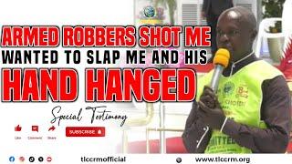 ARMED ROBBERS SHOT ME WANTED TO SLAP ME AND HIS HAND HANGED