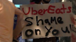 Uber Eats drivers protest over dwindling pay