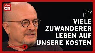 „Viele Zuwanderer leben auf unsere Kosten.“ - Streit um Sozialhilfe | Links. Rechts. Mitte