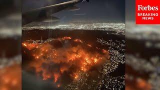 Passenger On Plane Captures Aerial Footage Of Los Angeles Wildfires