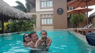 swimming at Canal Village Pakpra Patthalung Thailand