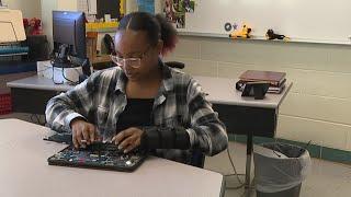 This 'geek squad' help desk is made up of middle schoolers