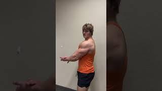 Young Muscle Guy In Orange Tank Top