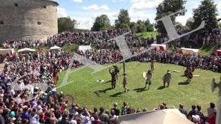 A crowd of people near the fortress of Old Ladoga. 4K.