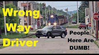 Wrong Way Driver Downtown Tries To BEAT The Train? What An Idiot! #train #trains #trainvideo