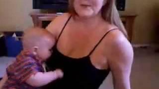 The Healthy, Sexy Mom Exercising with a Hungry Super-Baby